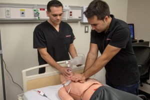 Image of men administering CPR