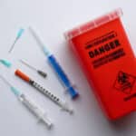 Contaminated sharps must be disposed of in designated sharps containers.