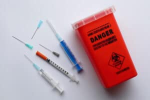 Contaminated sharps must be disposed of in designated sharps containers.